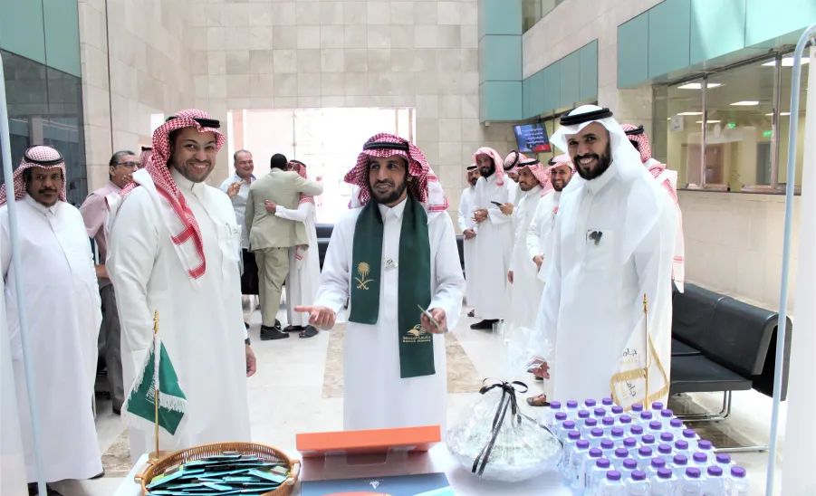 احتفال منسوبي عمادة القبول والتسجيل بمناسبة اليوم الوطني الـثالث والتسعين - 1