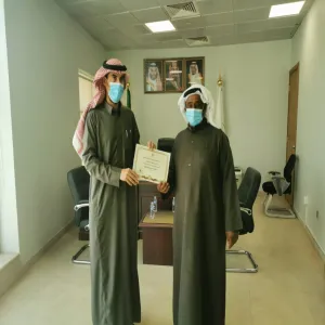 Honoring the staff Masud Najai