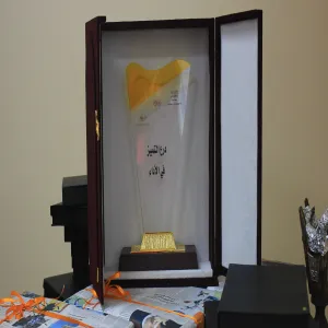 تكريم الموظفات المتميزات في الكلية خلال الفصل الأول من العام 1433-1434 هـ